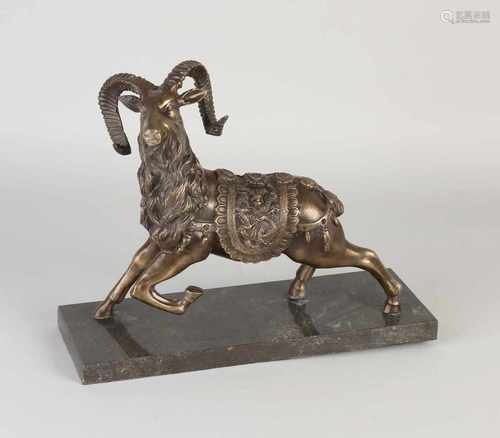 Chinese bronze ibex on black marble base. Size: 23 x 29 x 11 cm. In good condition.