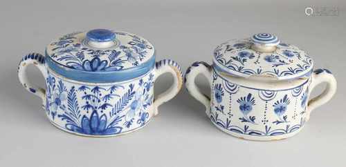 Two 18th century Delft Fayence butter covered jars with floral decor. One cover restored. One