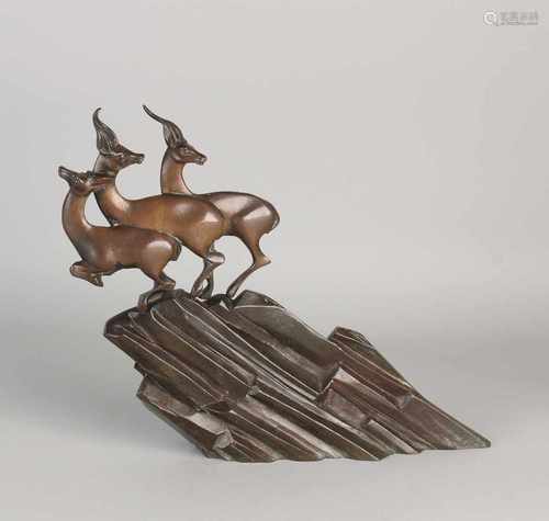 Bronze Art Deco Fig. Three ibex on rocks. By C. Daris. Circa 1930. Dimensions: 26 x 29 x 6 cm. In