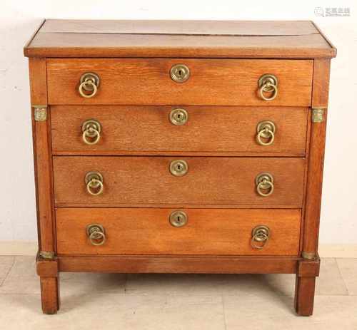 Dutch Louis Seize oak four-drawer chest of drawers with original brass ferrule and half Corinthian