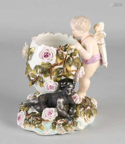 Antique German porcelain vase with Amor and reprocessed roses. Plaue. Potato chips. Size: H 16 cm.