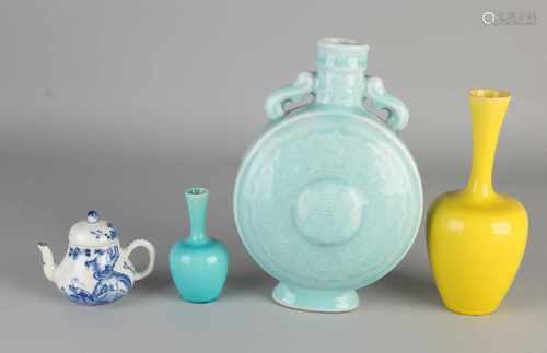 Four parts ancient Chinese porcelain. Consisting of: Signature teapot, spout damaged. Pipe Vase with