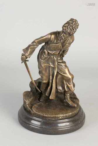 Russian-style bronze soldier to old model. But 21st century. On black marble base. Dimensions: 25