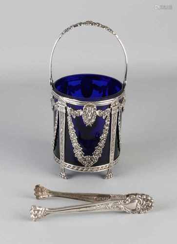 Silver ice bucket and tongs, 925/000, ice bucket with blue glass placed in a container decorated