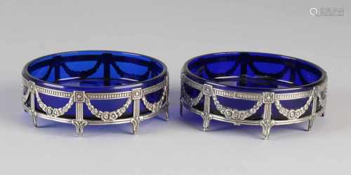 Two bowls of blue glass with silver holders, 925/000, round model decorated with garlands, flower