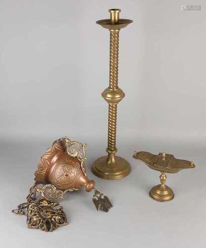 Three parts antique brass work. 19th century. Consisting of: Candlestick, incense burner holder.