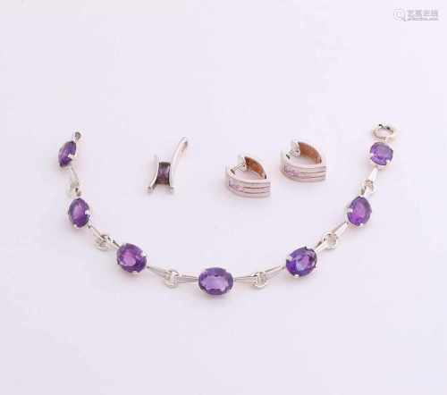 Three silver jewelry with colored stones. A bracelet with oval faceted amethyst, width 8 mm. 18,