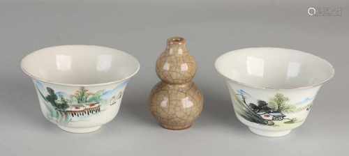 Three pieces of Chinese porcelain. Comprising: Celadon vase lump + two cups of landscape / figures /