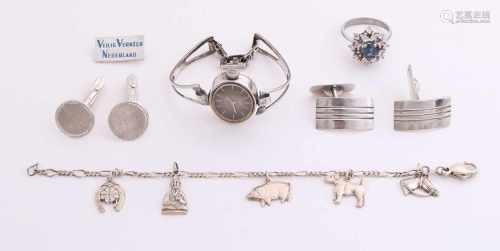 Lot silver jewelry cufflinks with two pair, a ring with rosette, a badge, a charm bracelet and a