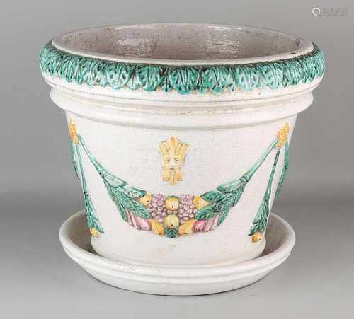 Large majolica pot with shell. Decorated with Fratzen and fruit garlands. Neo Renaissance. 20th