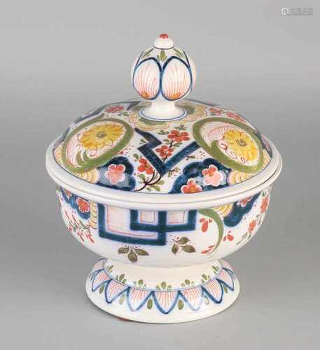 Polychrome hand painted earthenware lidded. Anno 1936. Marked on the bottom. Size: Ø 19 x 22 cm H.