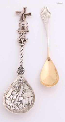 Two silver spoons, 835/000, with a spoon with sugar mill and processing in the bin, 14,5cm, and a