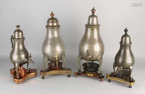 Four antique pewter jugs tap. 18th - 19th Century. Size: 35-45 cm. In good condition.