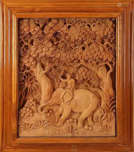 Large Asian carvings in list. Indian elephant with driver in forest. Three dimensional. Nice