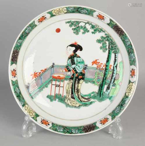 Large Chinese porcelain dish with Family Verte geisha in garden decor. Six signs bottom mark.