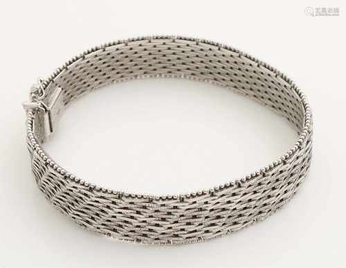 Silver bracelet, 925/000, braided model with beads around the edge. Equipped bakslot safety. Width