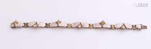 Silver design bracelet, 835/000, with rough processing, and partly provided with gold plating and