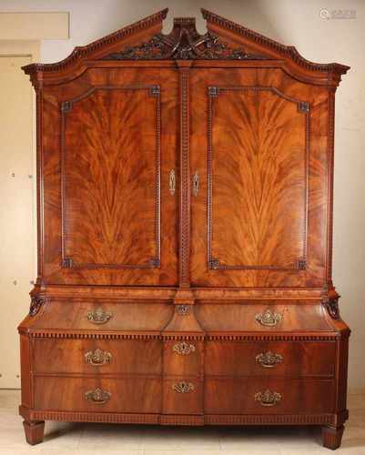 18th Century Dutch mahogany Louis Seize cabinet with tympanum head strip and beautiful carvings.