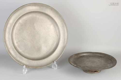 Two parts tin antiques. Comprising: One tazza, 17th - 18th century. One large dish with bottom