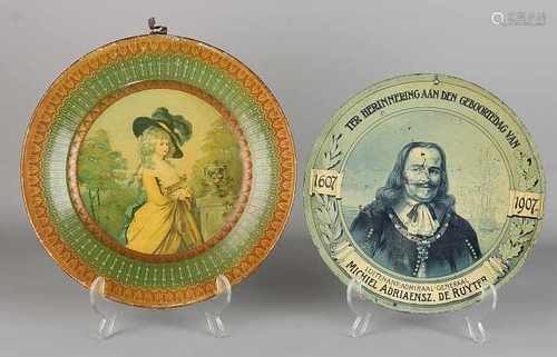 Two antique lithographed tin plates. One time Michiel de Ruyter, 1607 - 1907. One woman at times