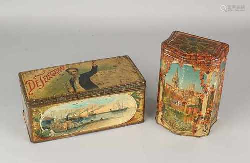 Two antique stock advertising tin. One time De Telegraaf 100 years. One time the Spanish look