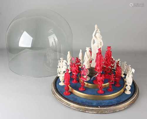 Rare antique ivory Chinese chess game comprising 32 chess pieces and loose centerpiece dancer. Circa