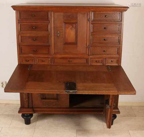 German Renaissance oak desk. Circa 1700. With original locks and many drawers behind writing flap.