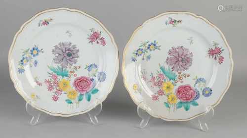 Two 18th century Chinese porcelain Family Rose plates with floral / gold decor and molded rim. Size: