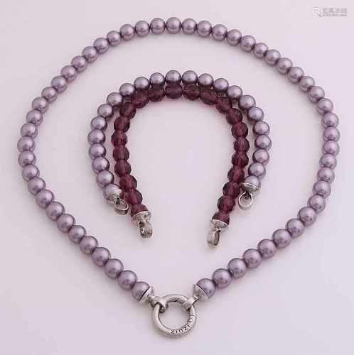 Pearl necklace, pearl bracelet and a bracelet of faceted beads, all purple with a silver clip