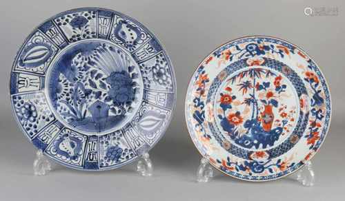 Twice China / Japan. One large 18th century Chinese dish, Imari, chip. One Japanese Arita dish,