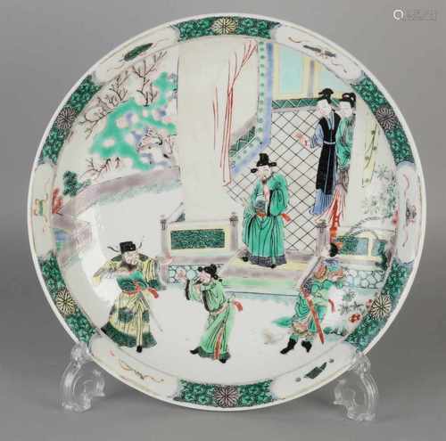 Large Chinese porcelain Family Verte plate with Kang bottom mark. Figures decor at Chinese building.