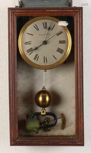 Antique French Electrique Brillie wall clock clock with oak cabinet and central seconds hand.