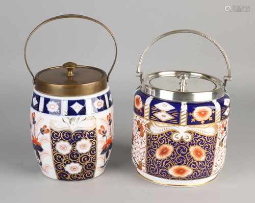 Two antique porcelain biscuit tins with Imari decor. However, Germany. Noticed. Circa 1920. Size: