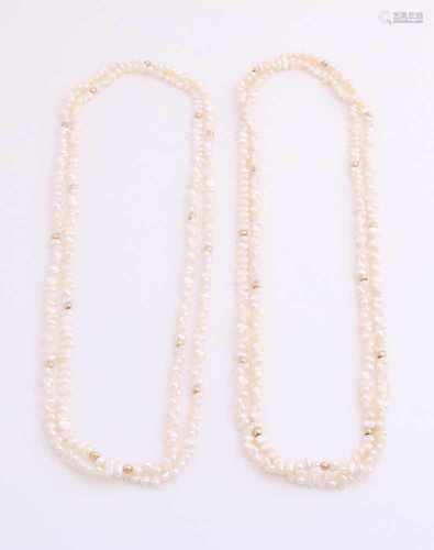 Two long necklace with small freshwater pearls adorned with gold beads. length 90 cm. In good