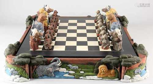 Great African pottery chess with animals + wooden chessboard. Size: 20 x 60 x 60 cm. In good