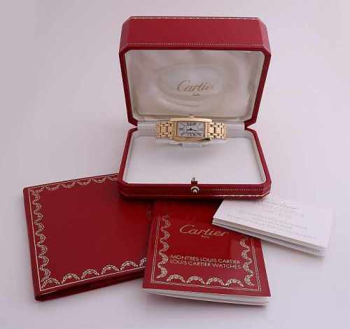 Yellow gold Cartier women's watch, 750/000, model Tank Americaine, with yellow gold band provided