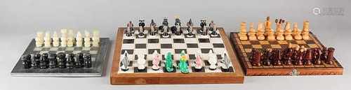 Three chess games. One time set animals, Brazil, chessboard with ceramic tiles and imitation ivory