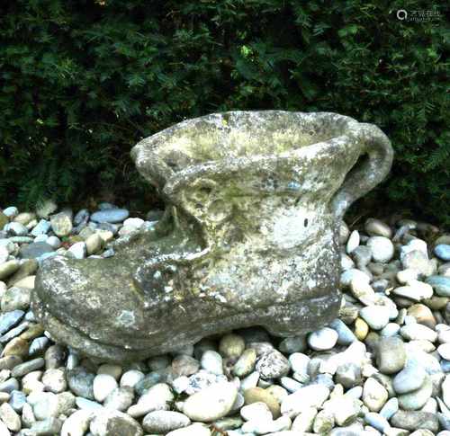 Large concrete poured vase in the shape of a shoe. 20th century. Size: 37 x 35 x 60 cm. In good