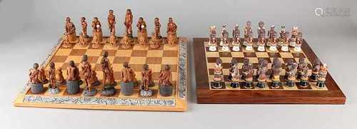 Two South African chess sets. One time Bush + Kangarus. One time Masai + animals. Plastic painted