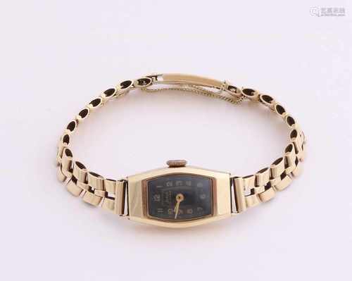 Yellow gold watch, 585/000, with gold ribbon. Oval shaped watch, brand Indus, with a black dial