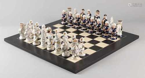 Royal Dux porcelain chess set with colored porcelain chess pieces and wooden chessboard. Size: 13