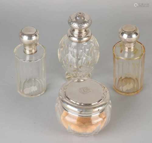 Four crystal bottles with silver, a powder box with silver lid with weapons carving; Tandem,