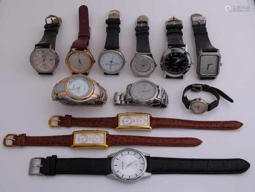 Box with 12 wristwatches, with leather, and metal band. Quarts models.