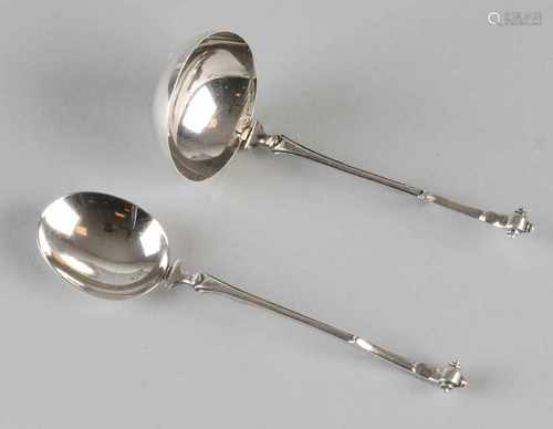 835/000 Silver sugar scoop, length: 12 cm. and 835/000 silver cream spoon length: 11 cm. With fine