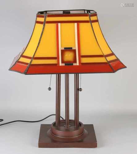 Art Deco-style Tiffany-style table lamp. Two-lights with two pull cords, metal base and a glass cap.