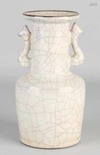 Chinese celadon vase with white crackle glaze and bottom mark. 20cm high in good condition.