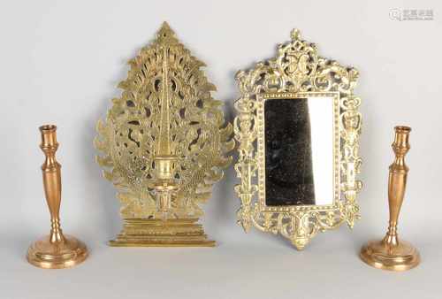 4x Antique brass. Consisting of: 2x 19th Century candlesticks. Historic mirror, circa 1880. Oriental