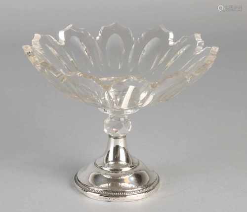 Antique cut crystal candy dish with almond sharps and 835/000 silver base on a roll. Mr. J.M. van