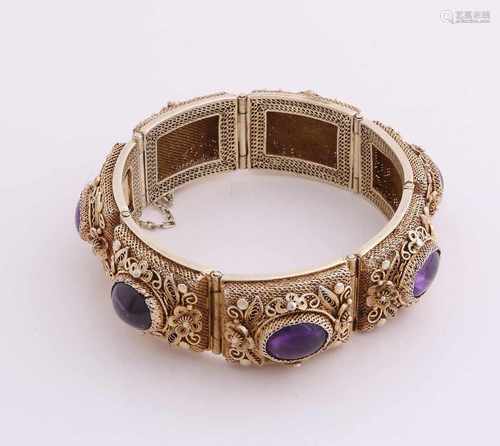 Silver plated bracelet with purple stones. Bracelet with large rectangular open-work filigree