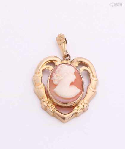 Heart heart pendant, 412/000, in the middle set with an oval cut gemstone. 23x35mm. approximately